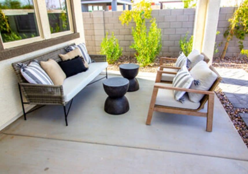 Concrete Patio with chairs and sofa outside the house in Raleigh, NC